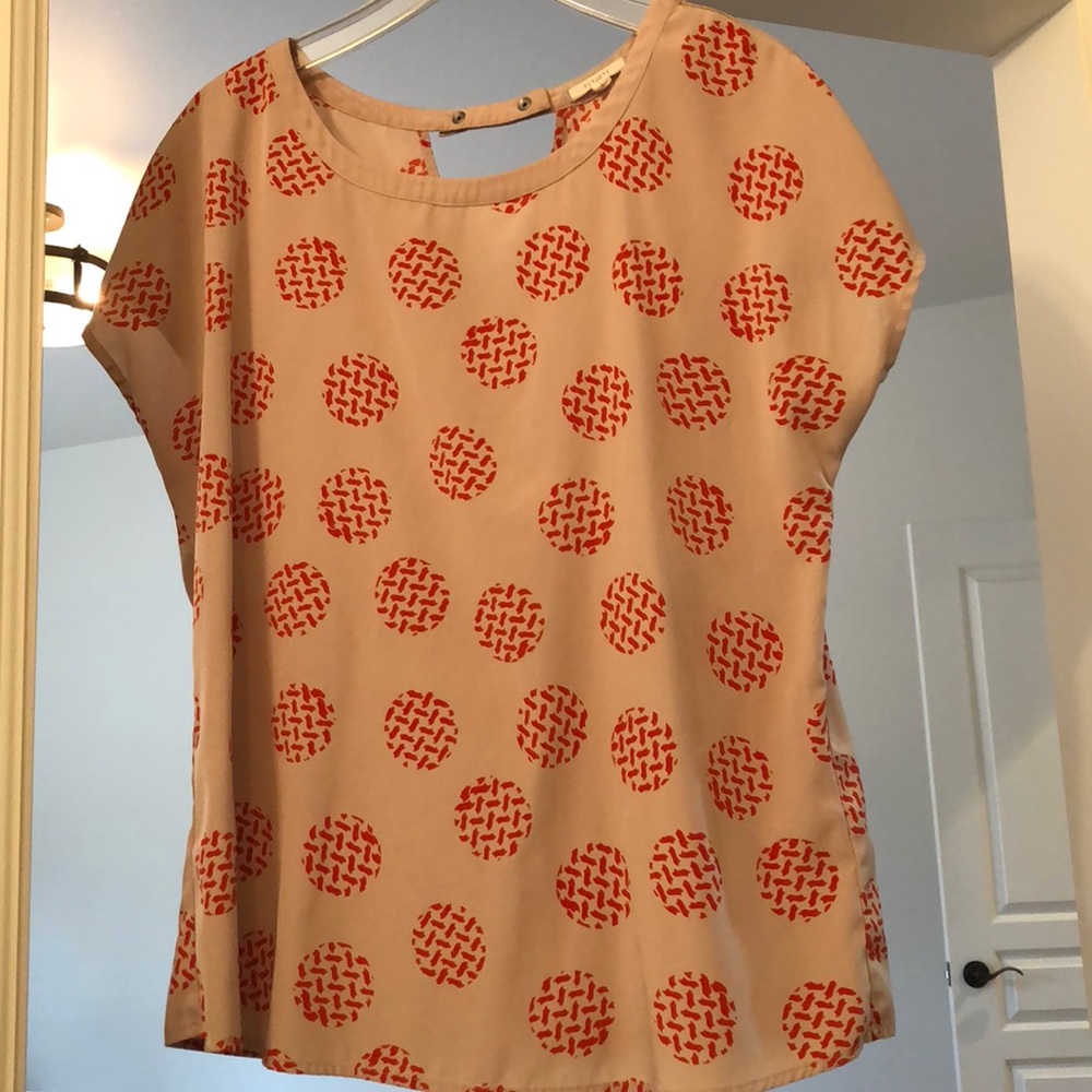 Super cute tan and orange blouse